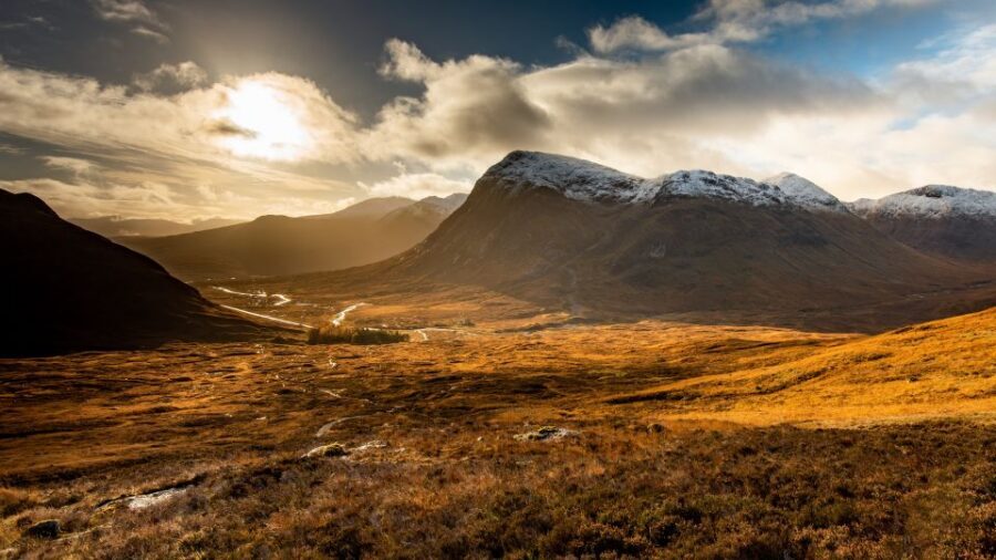 From Glasgow: Glenfinnan, Fort William, and Glencoe Day Trip - Your guide makes the day: humor, stories, and music on the coach