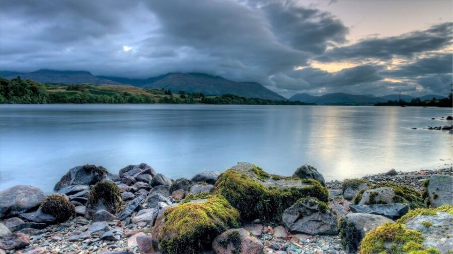 From Glasgow: Standing Stones, Castles & Highlands Tour - Luss and Loch Lomond’s western shore: the scenic warm-up